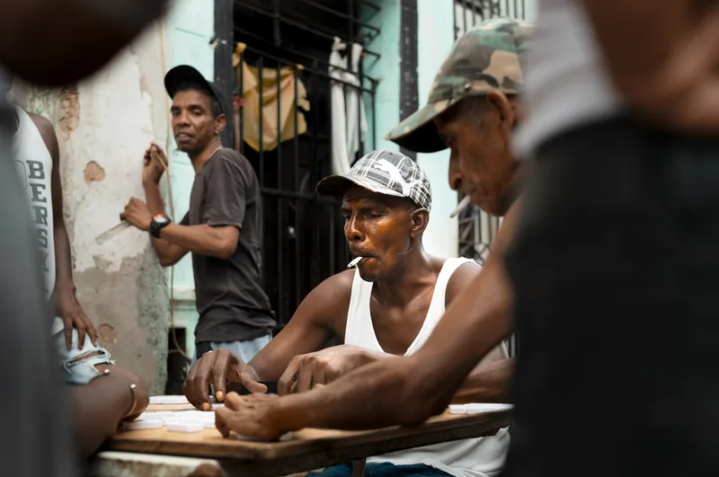 Domino players in the street in Cuba